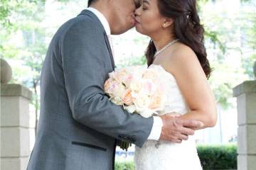 Bride and groom kiss