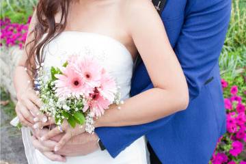 Bride and groom embrace