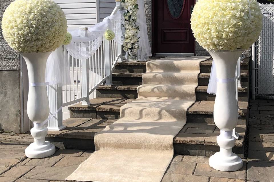 White arch with rose balls