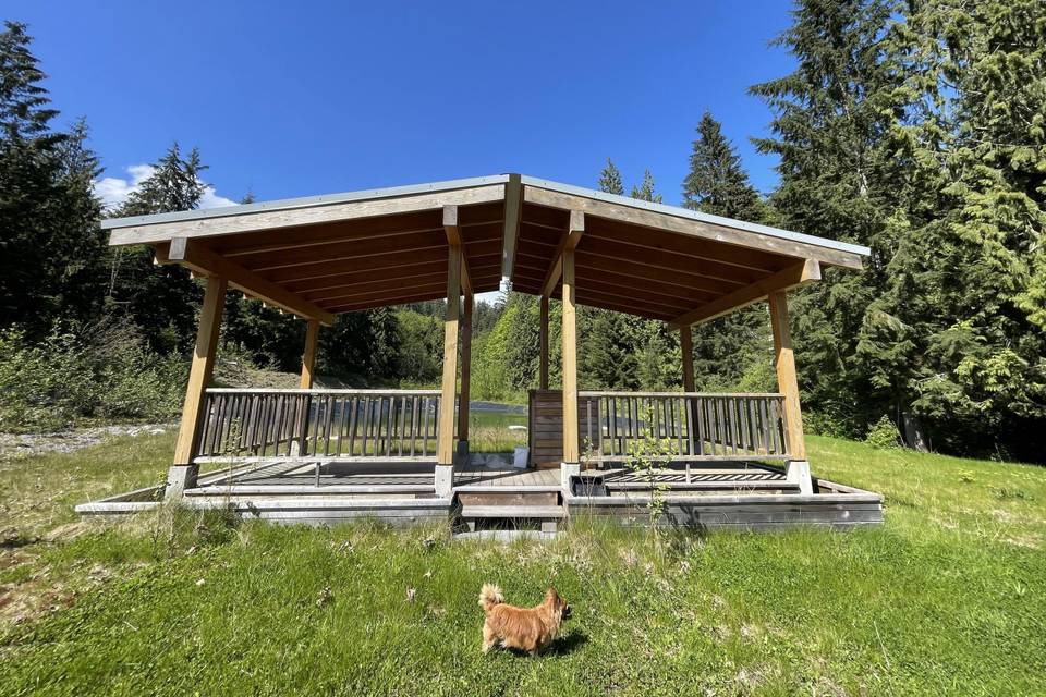 Pergola in front of mini-lake