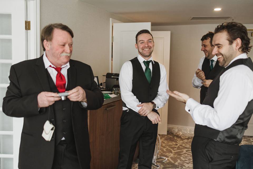 Groomsmen laughing