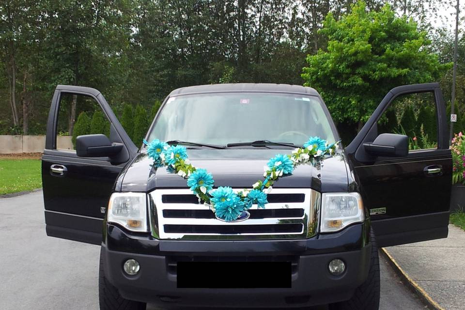 Black SUV with flowers