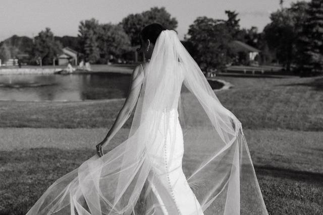 Elegant bride twirls in gown