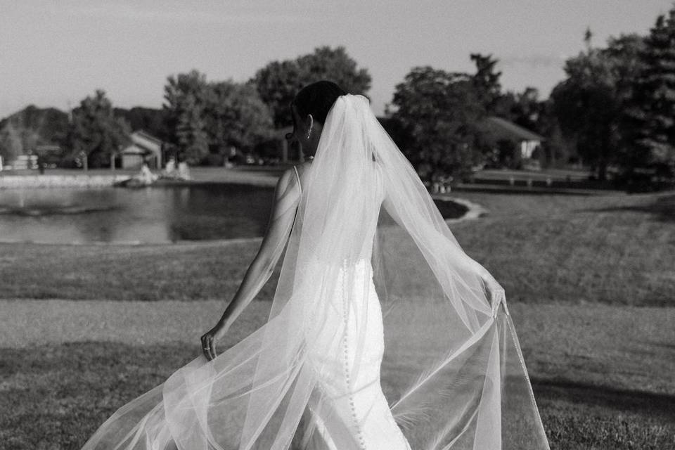Elegant bride twirls in gown
