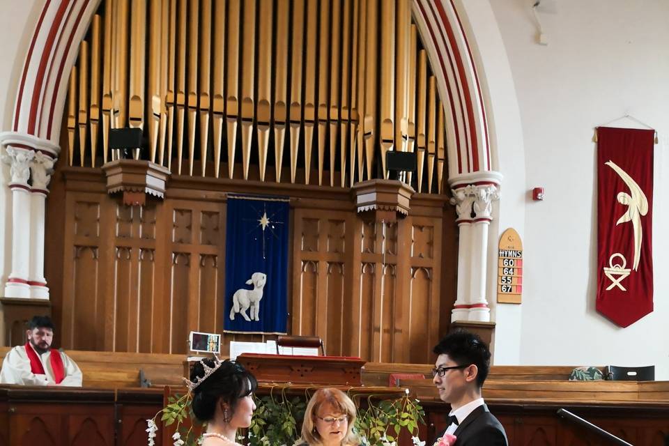 Rev. Angela with the couple