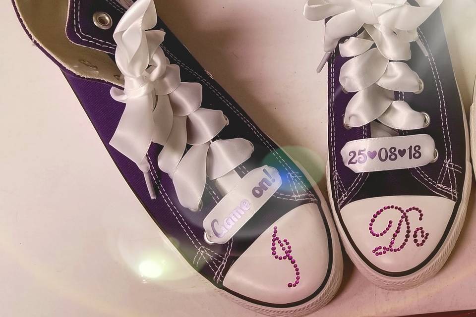 White laces with metallic purple