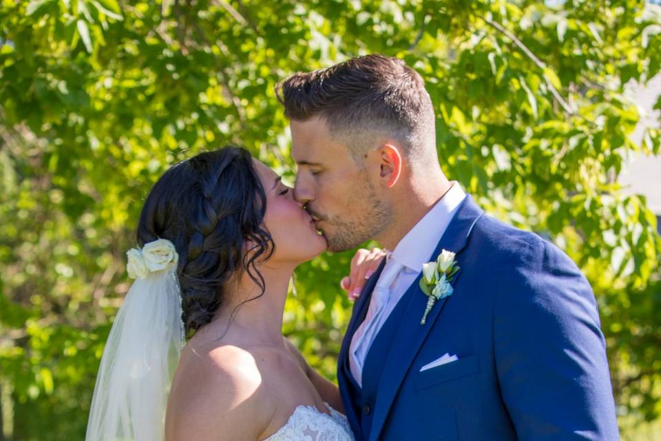Newlyweds kissing