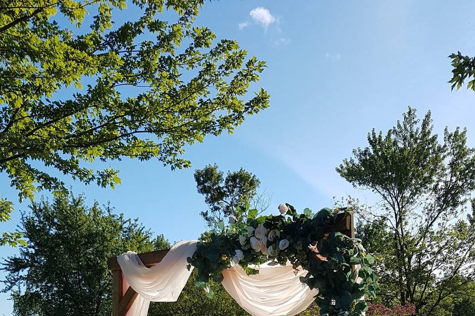 Wooden arbour & blush draping