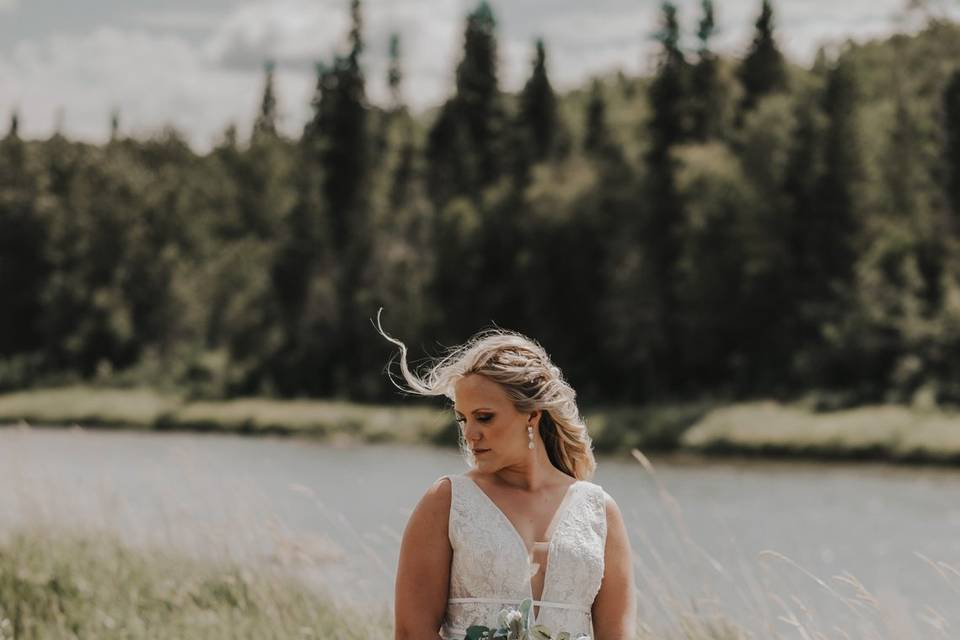 A Bride by a River