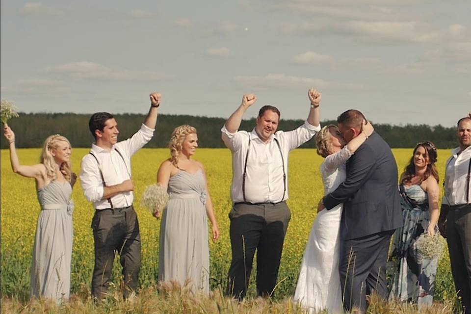 Canola field with party