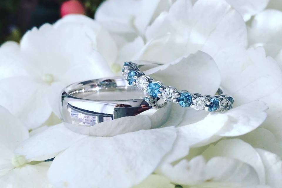 wedding rings aqua blue background