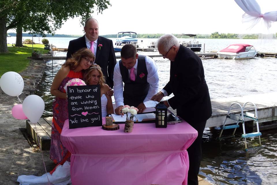 Signing the papers