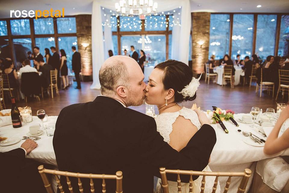 A couple shares a kiss