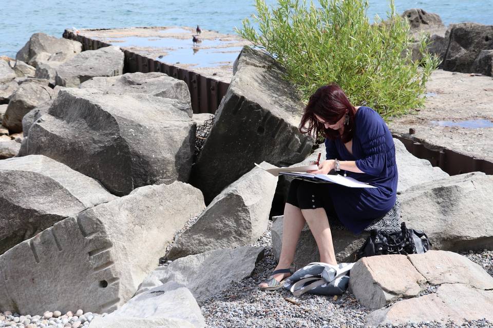 Signing papers on the beach!