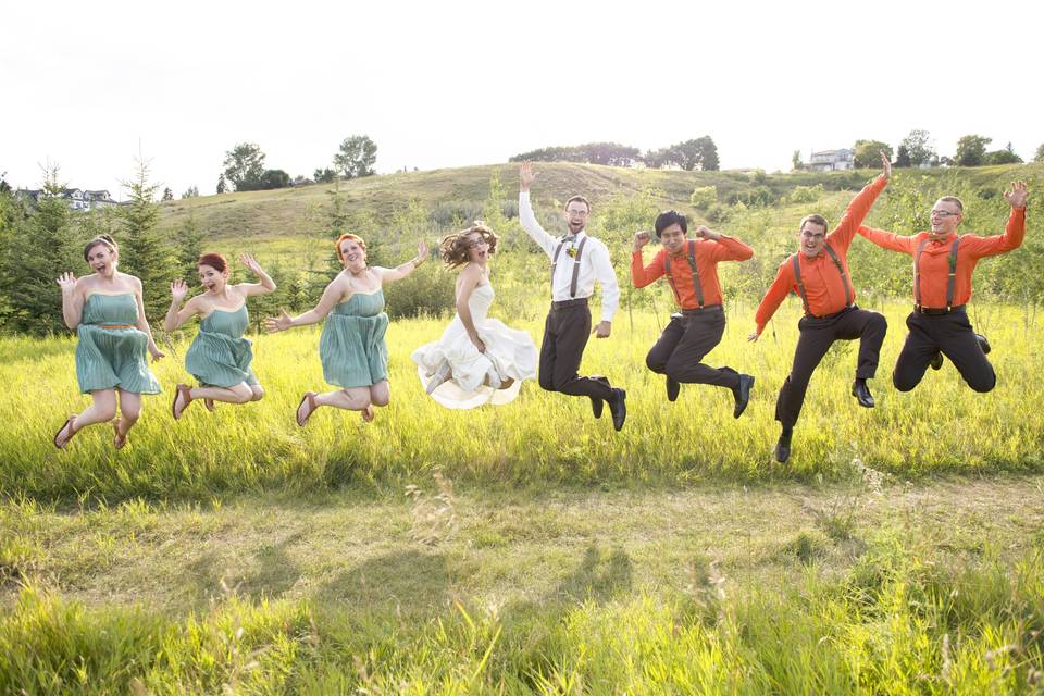 Wedding party jumping