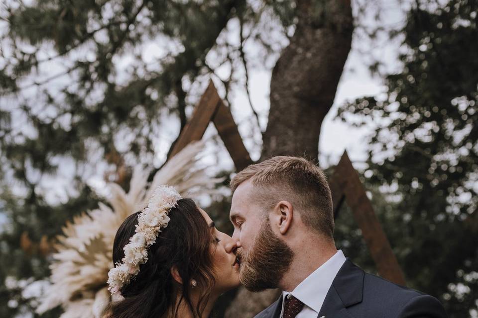 Bride and groom first kiss