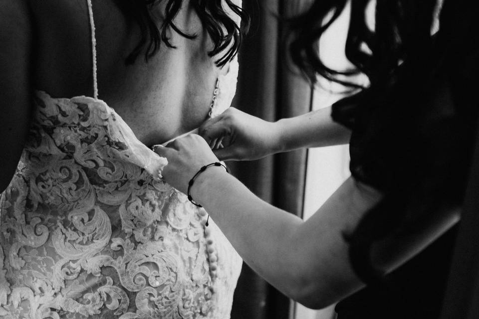 Buttoning up the dress
