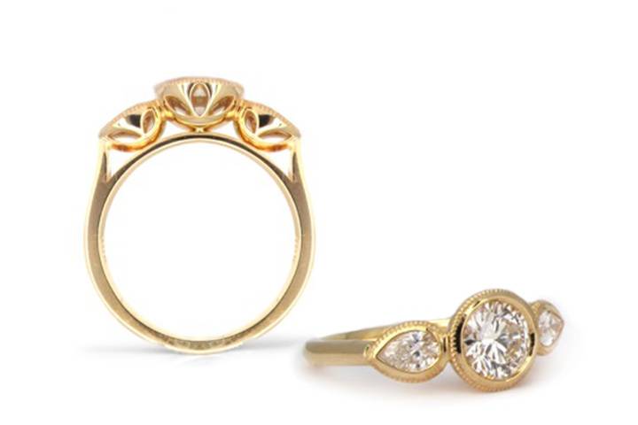 3 Stone Diamond 18ky ring.