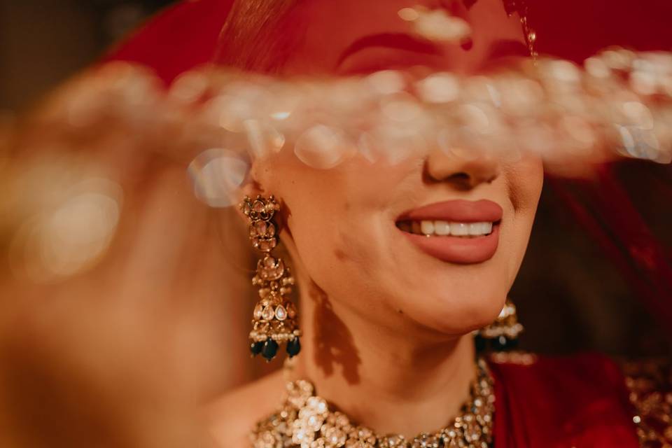 Radiant smile and jewelry.