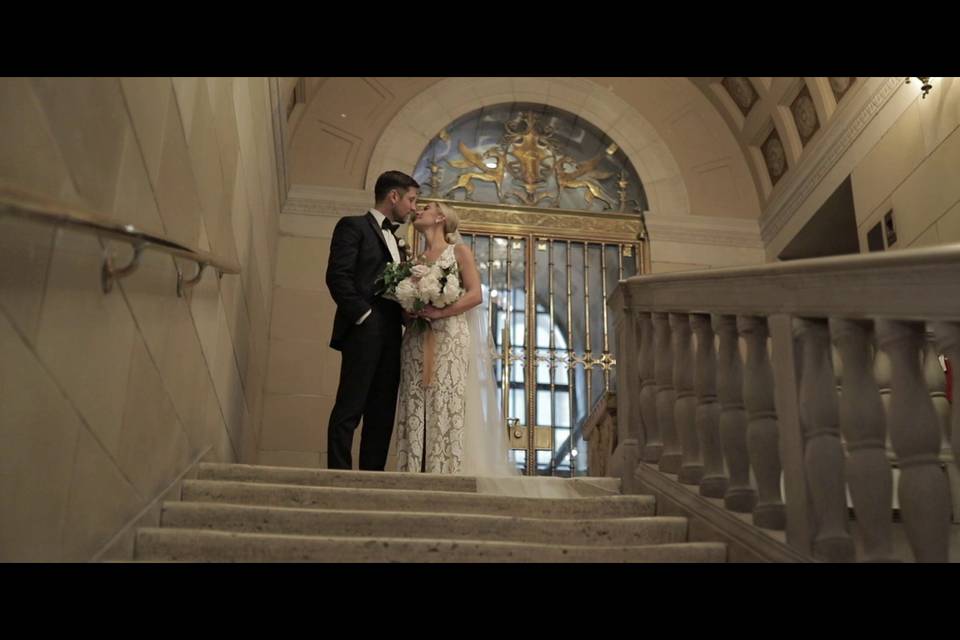 A kiss at the top of the stair