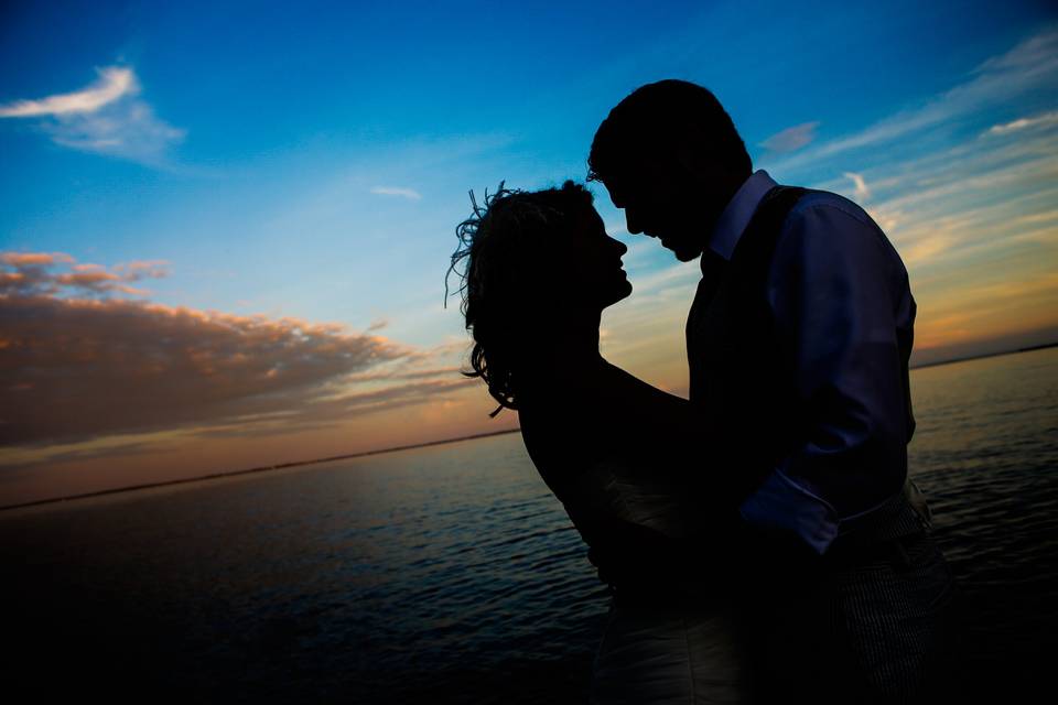 Bride  Groom silhouette sunset