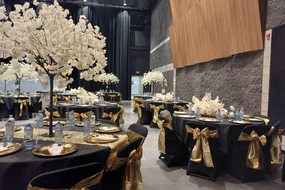 Black and gold reception setup