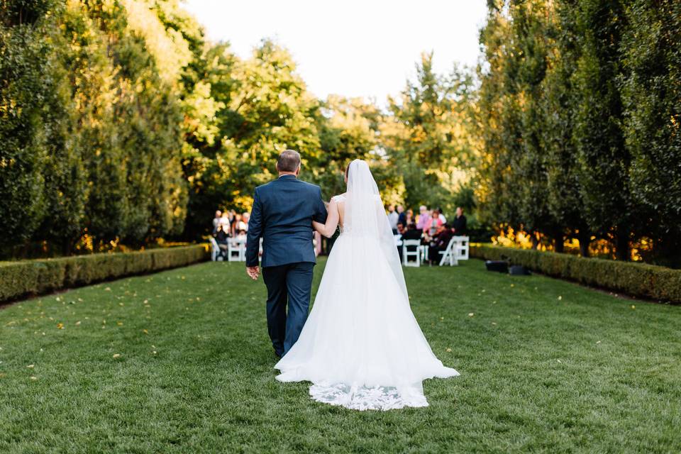 C & Dad walking down aisle