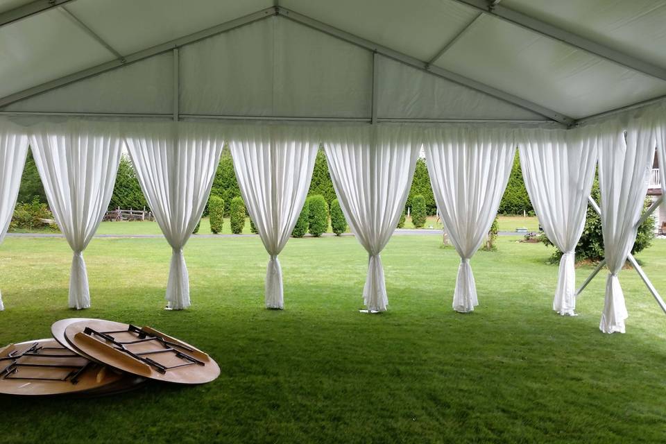 Frame tent with pole drapes