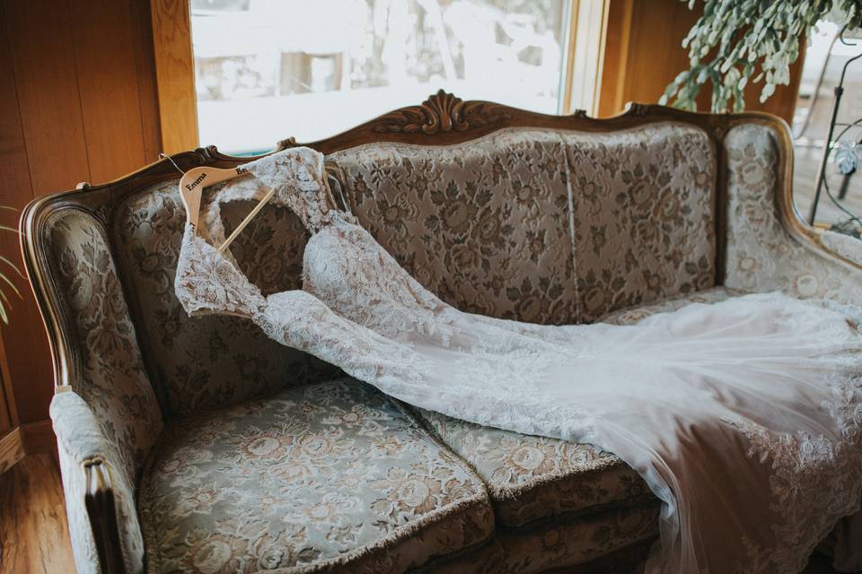 Wedding dress on antique couch