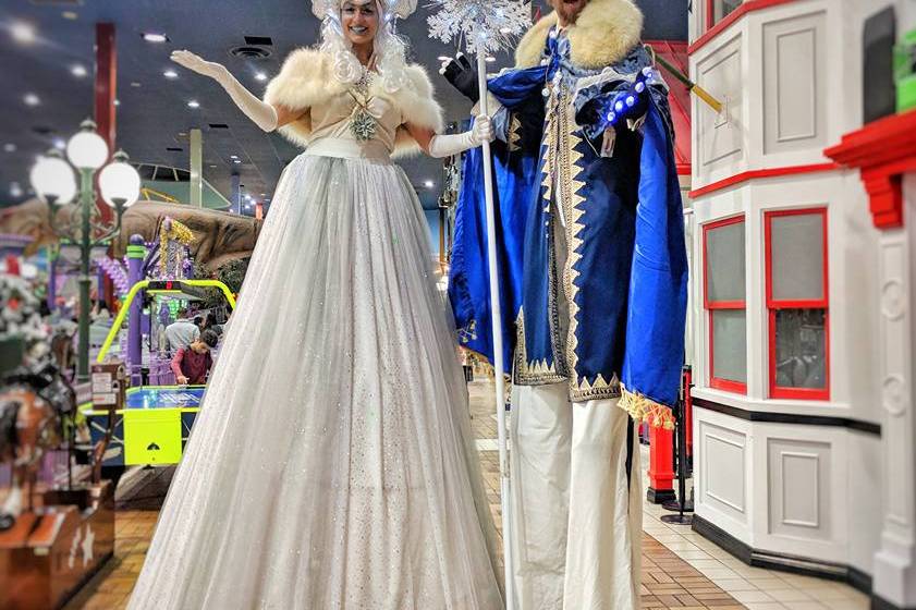 Ice queen and king on stilts