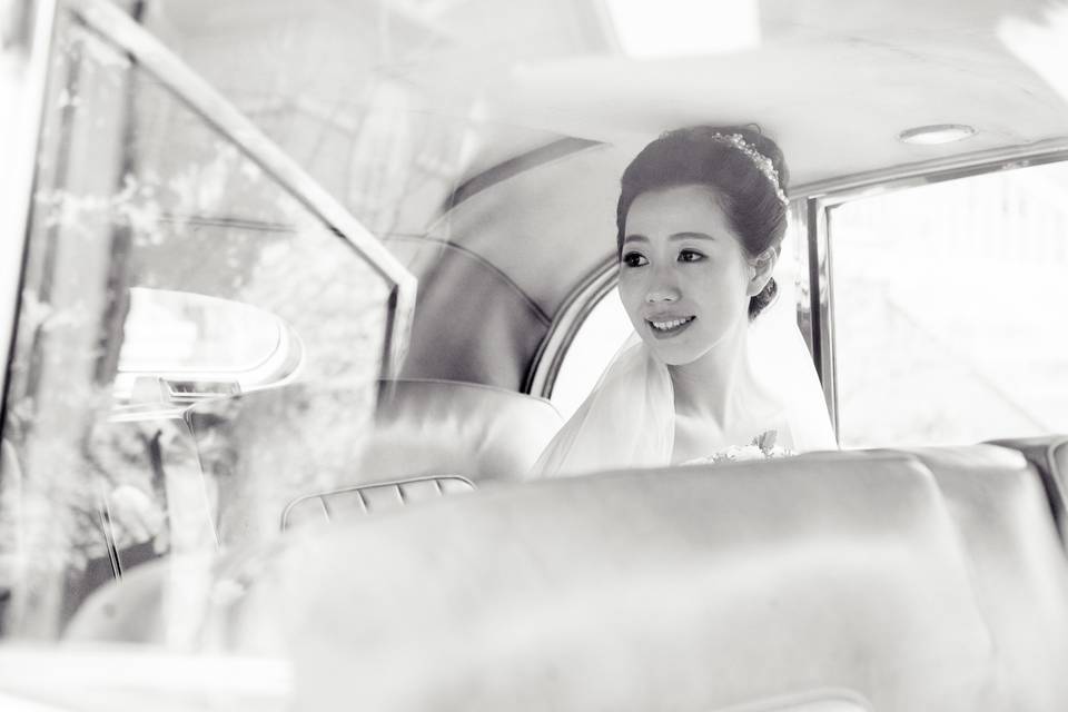 Bride in the vintage car