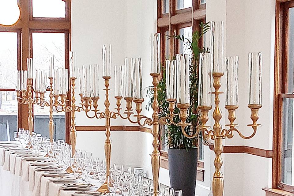 Gold candelabras with taper ca