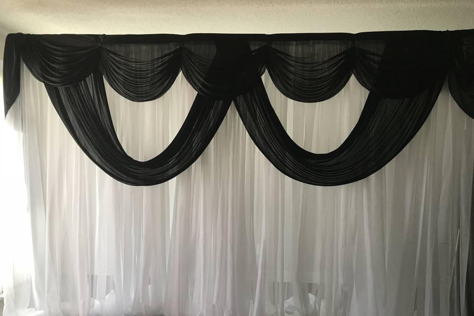 White voile and black backdrop