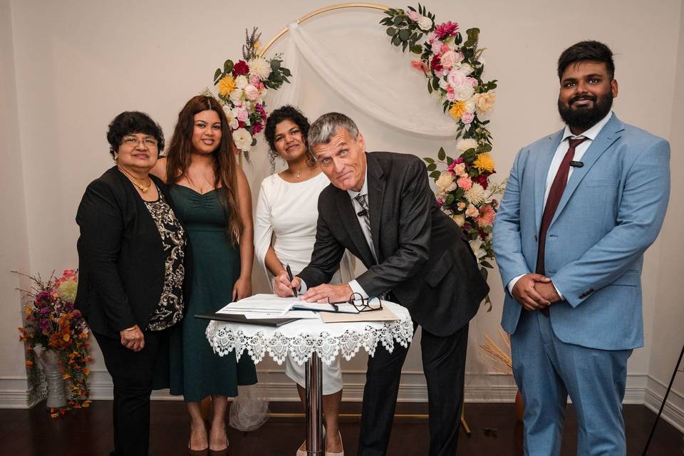 Signing the papers!