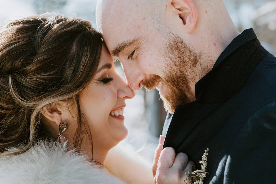 A bride and groom kissing