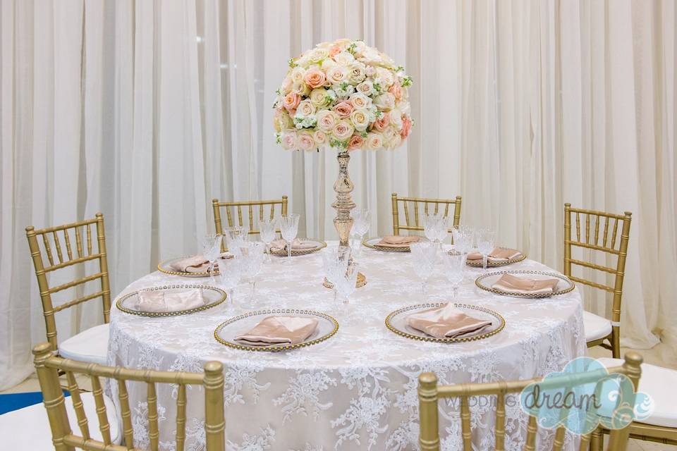 Gold chiavari cahirs with lace