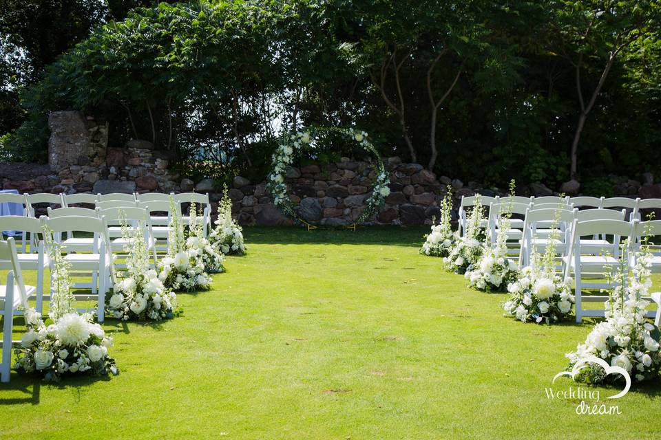 Aisle florals and floral arch