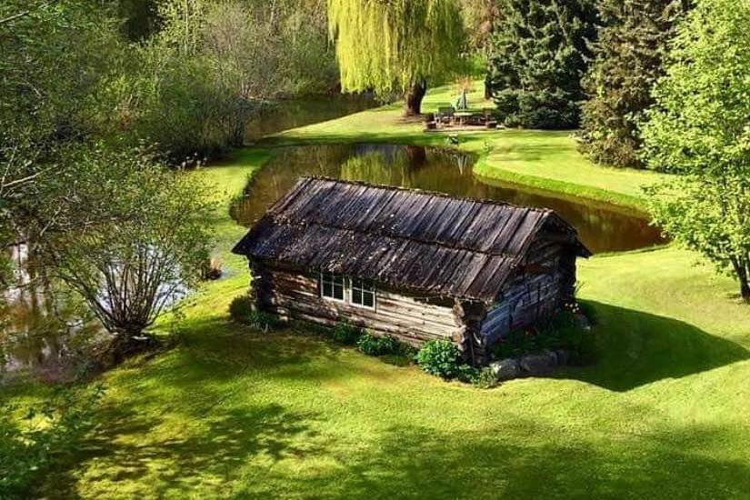 Log cabin in the spring