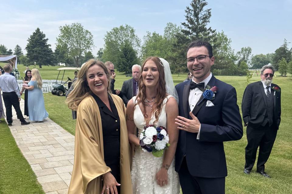 Showing off the wedding ring!