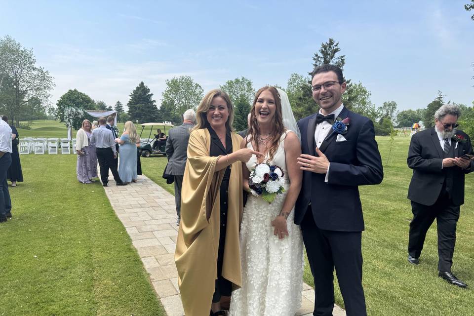 Showing off the wedding ring!