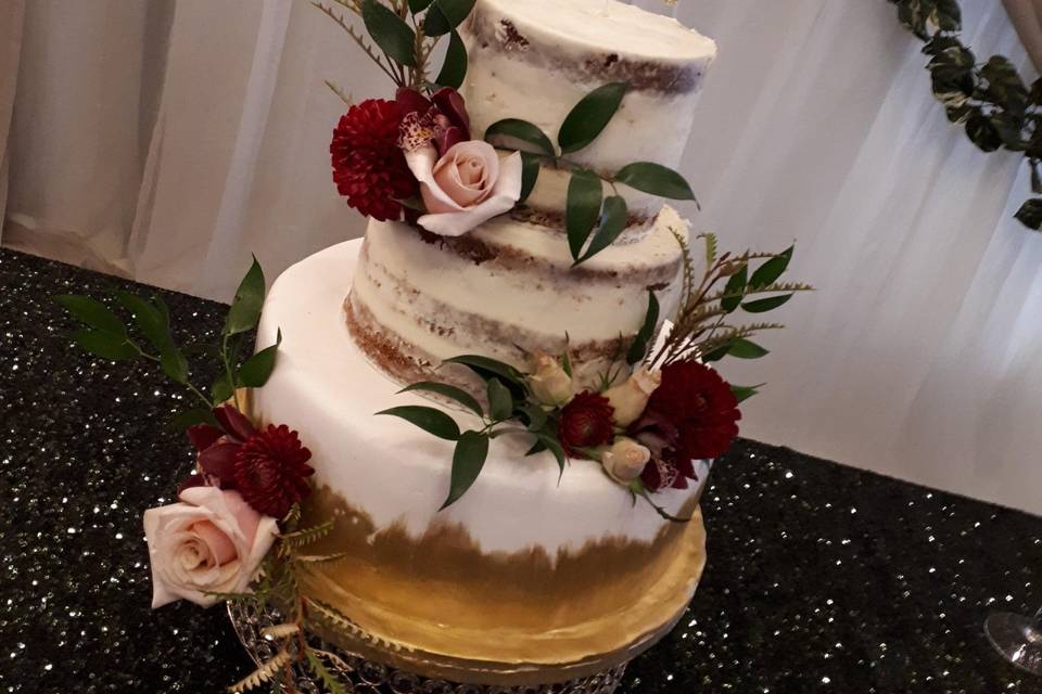 Naked cake with fondant and fresh floral