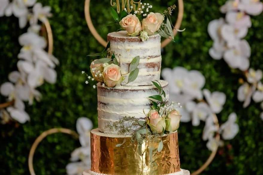 Naked cake with edible gold design