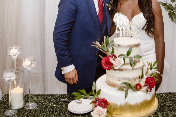 Newlyweds with their cake