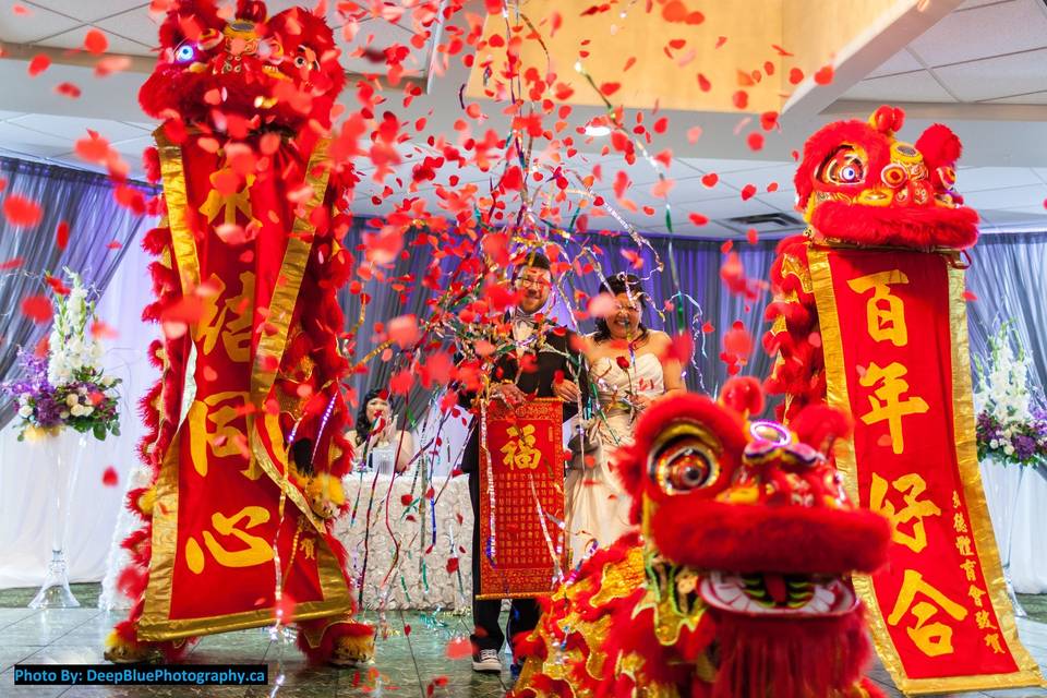 Entertainers perform lion dance during the opening ceremony of the