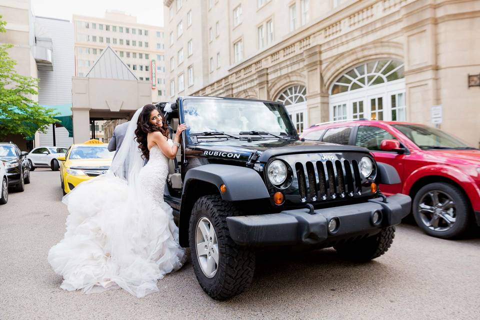 Bride with her hummer limo