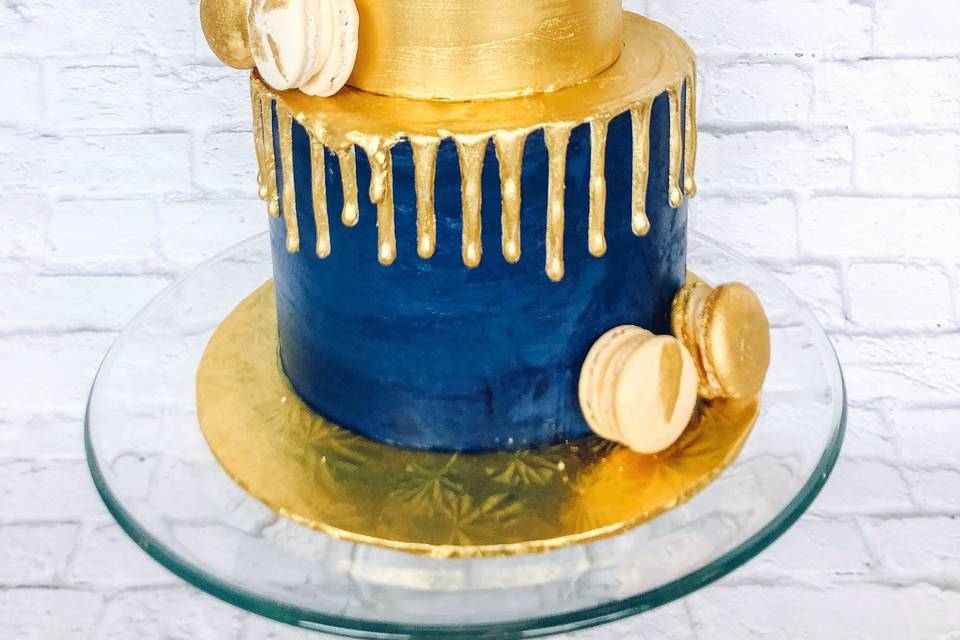 Gold brush cake with macarons