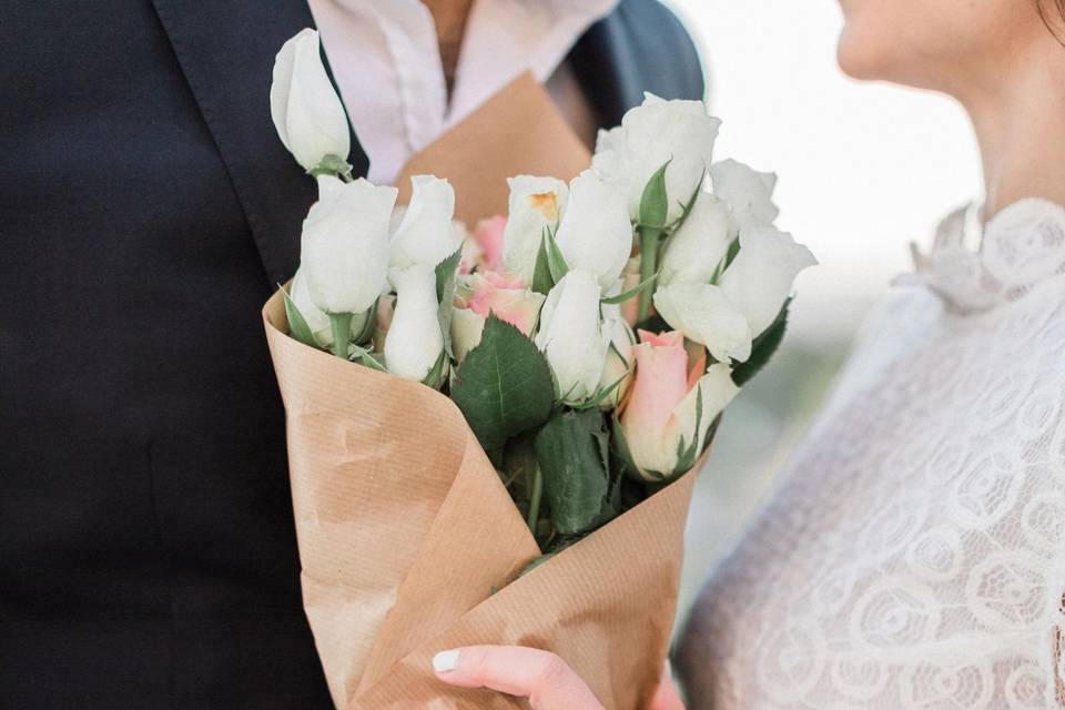 Newlyweds with flowers