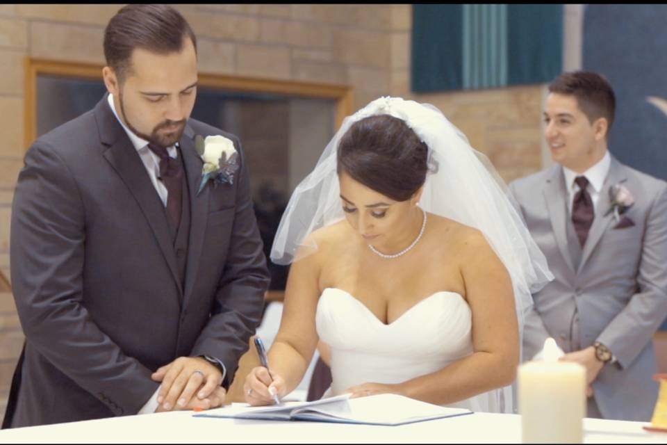 Signing the marriage certificate