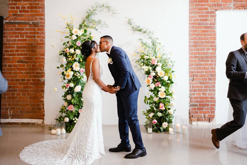 Fist kiss wedding florals loft