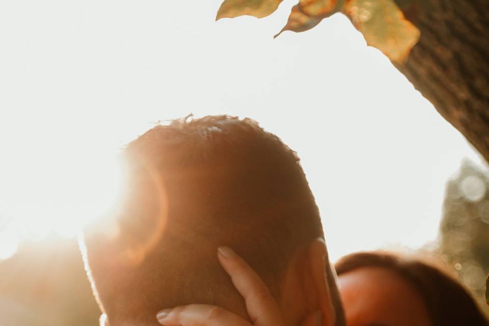 Sweet kiss during golden hour